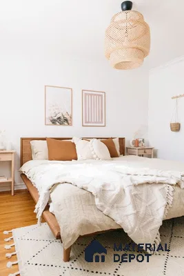 a room filled with lots of windows and a plant in the corner next to it on the floor of a wall next to a white wall mounted faucet and a white counter top of a room filled with